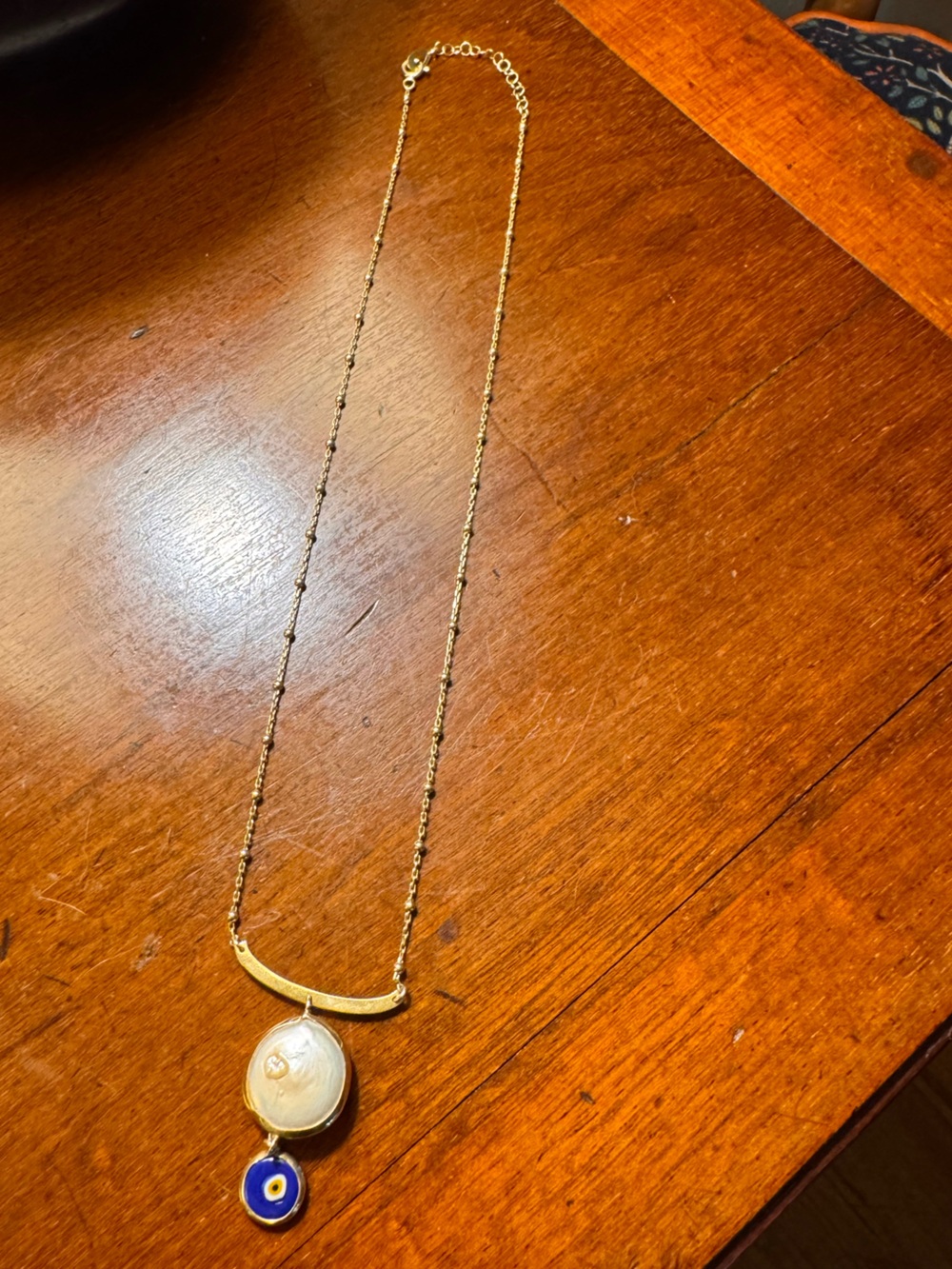 Gold plated evil eye necklace, like new